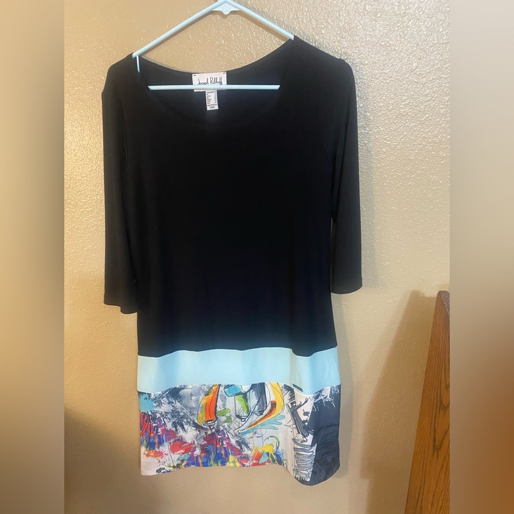 Ribkoff size 10 . This dress comes from a non smoking environment and pet free.